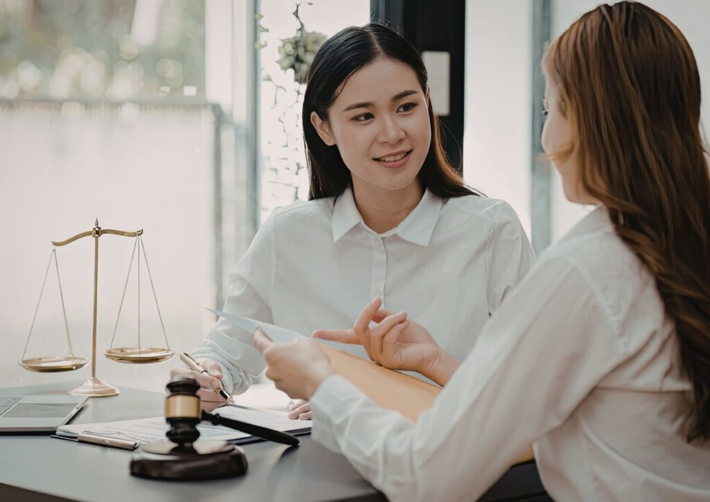 Solicitor providing legal advice to a client during a consultation